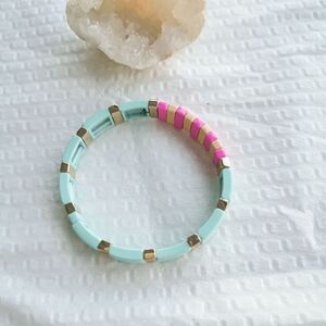 New Gold Roxanne Assoulin Rainbow Brite Light Blue Pink Orange Stretch Bracelet